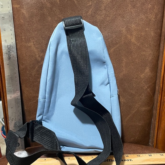 Blue Backpack with Colorful Patches - Picture 2 of 3